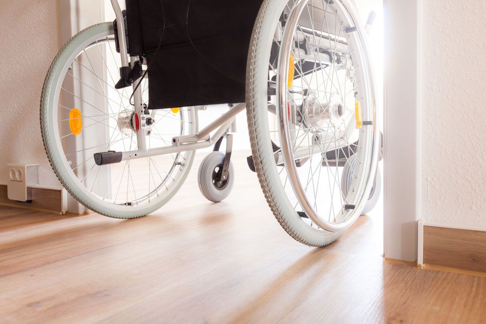 wheel chair in doorway - Care Home Refurbishments